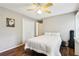 Bedroom with hardwood floors, double closets, and a ceiling fan at 2819 Saddlebrook Nw Way, Marietta, GA 30064