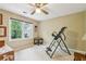 Bedroom with exercise equipment and large windows at 2819 Saddlebrook Nw Way, Marietta, GA 30064