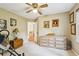 Bedroom with exercise equipment, carpet floors, and dresser storage at 2819 Saddlebrook Nw Way, Marietta, GA 30064