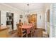 Elegant dining room features hardwood floors, a chandelier, and a wooden china cabinet, perfect for entertaining at 2819 Saddlebrook Nw Way, Marietta, GA 30064