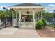 Community gazebo with ceiling fans, seating and fenced in pool and playground nearby at 2819 Saddlebrook Nw Way, Marietta, GA 30064