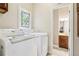 Convenient laundry room with modern washer and dryer at 2819 Saddlebrook Nw Way, Marietta, GA 30064