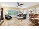 Bright living room with hardwood floors, a fireplace, and comfortable seating, perfect for relaxing or entertaining guests at 2819 Saddlebrook Nw Way, Marietta, GA 30064