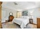 Main bedroom with tray ceilings, area rug and traditional furnishings at 2819 Saddlebrook Nw Way, Marietta, GA 30064