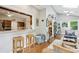 Bright sunroom features a view of the kitchen with bar top seating at 2819 Saddlebrook Nw Way, Marietta, GA 30064