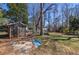 A spacious backyard featuring a shed and potential for gardening at 3594 Vinyard Way, Lawrenceville, GA 30044