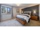 Modern bedroom with large window, neutral tones, and ample natural light at 3594 Vinyard Way, Lawrenceville, GA 30044