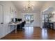 Bright home office space with hardwood floors, modern lighting, and sliding glass doors to the patio at 3594 Vinyard Way, Lawrenceville, GA 30044