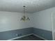 Classic dining room featuring a traditional chandelier at 676 Bralorne Dr, Stone Mountain, GA 30087