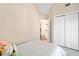 Bedroom with a bed, plush carpet and closet at 7104 Big Woods Dr, Woodstock, GA 30189