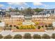 Community area featuring water feature, sign, landscaping, and bench seating at 1053 Knoxboro Ln, Woodstock, GA 30188