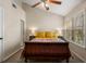 Comfortable bedroom featuring a wooden sleigh bed and natural light from a window at 380 Grant Se Cir # 110, Atlanta, GA 30315
