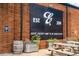 This exterior brick wall features prominent business signage, adding character and establishing a unique brand presence at 380 Grant Se Cir # 110, Atlanta, GA 30315