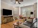 Cozy living room featuring hardwood floors, a bay window seat and ceiling fan at 380 Grant Se Cir # 110, Atlanta, GA 30315