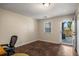 Office space with hardwood floors, natural light, and an exit to a patio at 380 Grant Se Cir # 110, Atlanta, GA 30315
