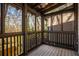 Cozy screened porch with views of lush greenery and mature trees at 380 Grant Se Cir # 110, Atlanta, GA 30315