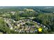 Ariel view of a residential area showing the location of the house and it's proximity to surrounding greenery at 4770 Shiloh Springs Rd, Cumming, GA 30040