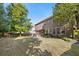 Spacious backyard with mature trees, offering plenty of room for recreation and enjoying the outdoors at 4770 Shiloh Springs Rd, Cumming, GA 30040