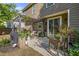 Charming backyard with a covered patio, perfect for outdoor entertaining and relaxation at 4770 Shiloh Springs Rd, Cumming, GA 30040