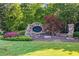 Stone entrance sign of the Maristone community, surrounded by manicured landscaping and greenery at 4770 Shiloh Springs Rd, Cumming, GA 30040