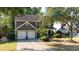 Charming two-story home with a well-manicured front yard, two-car garage, and inviting curb appeal at 4770 Shiloh Springs Rd, Cumming, GA 30040
