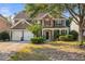 Beautiful two-story home with stone accents, manicured landscaping, and a two-car garage at 4770 Shiloh Springs Rd, Cumming, GA 30040