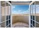 Balcony with a view of a tree line and blue skies with white clouds at 2161 Peachtree Ne Rd # 405, Atlanta, GA 30309