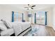Bedroom with ceiling fan and French doors leading to balcony with beautiful view at 2161 Peachtree Ne Rd # 405, Atlanta, GA 30309