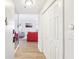 Hallway leading to the living area with hardwood floors and closet at 2161 Peachtree Ne Rd # 405, Atlanta, GA 30309