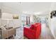 Bright living room featuring hardwood floors, and balcony with French doors at 2161 Peachtree Ne Rd # 405, Atlanta, GA 30309