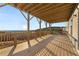 Expansive covered deck with natural wood and open view of the tree line at 231 Laurel Vista Dr, Canton, GA 30114