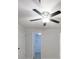 Bright bedroom with ceiling fan, closet, and doorway at 300 Johnson Ferry Ne Rd # B113, Atlanta, GA 30328