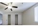 Bedroom featuring ceiling fan, a window, and closet at 300 Johnson Ferry Ne Rd # B113, Atlanta, GA 30328