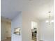 Open-concept living room, kitchen, and dining area with new wood floors at 300 Johnson Ferry Ne Rd # B113, Atlanta, GA 30328