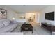 Spacious living room with stainless appliances and an open kitchen and dining area at 300 Johnson Ferry Ne Rd # B113, Atlanta, GA 30328