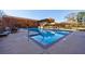 Outdoor pool with clear blue water and surrounding lounge area at 300 Johnson Ferry Ne Rd # B113, Atlanta, GA 30328