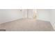 A bright, carpeted bedroom at 8516 Polston Place Dr, Douglasville, GA 30134