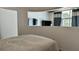 Bedroom showing a media area and large window at 943 Peachtree Ne St # 704, Atlanta, GA 30309