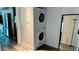 Convenient laundry room with stacked washer and dryer at 943 Peachtree Ne St # 704, Atlanta, GA 30309