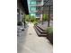 Community patio area with a pergola and seating, perfect for relaxation and socializing at 943 Peachtree Ne St # 704, Atlanta, GA 30309