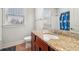 Bathroom featuring granite countertops and a shower with a curtain at 1602 Renaissance Ne Dr, Conyers, GA 30012