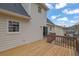 The wooden back deck offers outdoor living space and complements the home's exterior at 2520 Waterford Park Dr, Lawrenceville, GA 30044