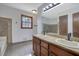 Primary bathroom has a double vanity and granite countertops at 2520 Waterford Park Dr, Lawrenceville, GA 30044