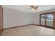Light and airy bedroom has laminate wood floors and a large window at 2520 Waterford Park Dr, Lawrenceville, GA 30044