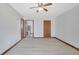 Bedroom boasts wood floors, a ceiling fan and two closets at 2520 Waterford Park Dr, Lawrenceville, GA 30044