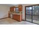 This eat-in kitchen boasts stainless appliances, wood cabinets and access to the back deck at 2520 Waterford Park Dr, Lawrenceville, GA 30044