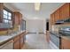 Kitchen featuring stainless appliances, a granite countertop, and a serving window to the dining area at 2520 Waterford Park Dr, Lawrenceville, GA 30044
