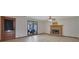 Comfortable living room with a brick fireplace, light wood floors, and a door leading to the outside at 2520 Waterford Park Dr, Lawrenceville, GA 30044