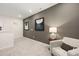 Cozy loft area with comfortable seating, soft carpet, and decorative accents at 2565 Ravencliff Dr # 74, Austell, GA 30168