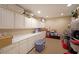 Spacious basement area offering ample storage with long countertops and lots of cabinets at 1023 Spruce Creek Ln, Lawrenceville, GA 30045